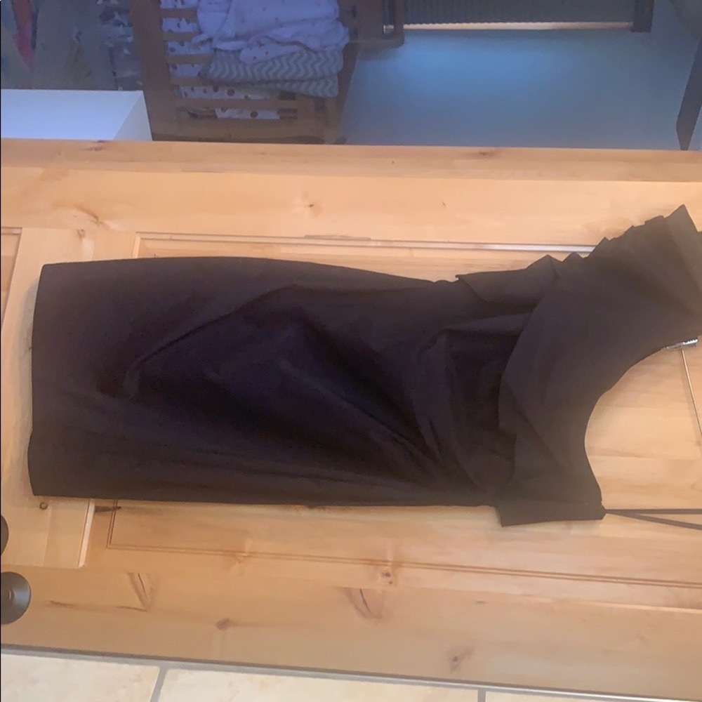 Black cocktail length one shoulder dress